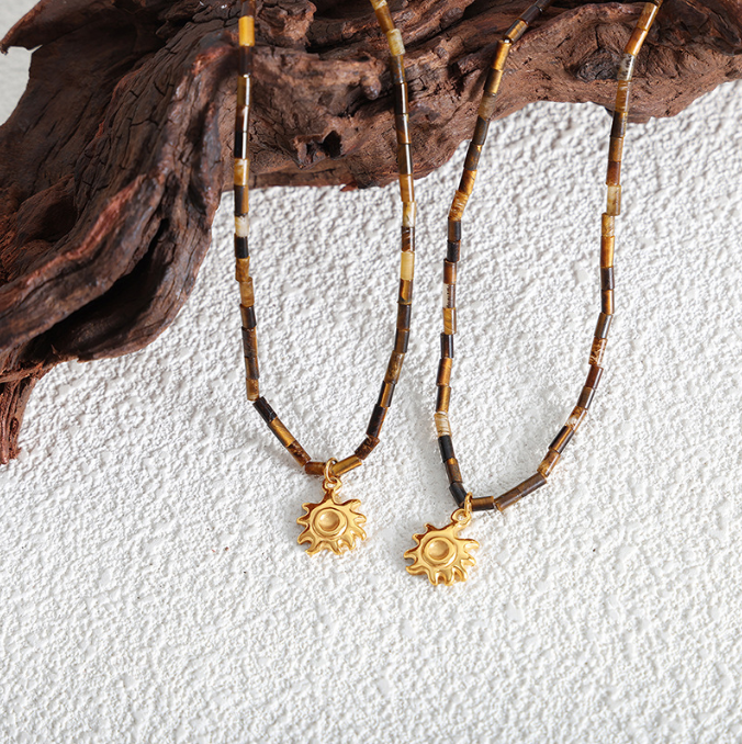 Fashionable titanium steel jewelry with tiger eye stone beads paired with small sun pendant collarbone design sense of niche